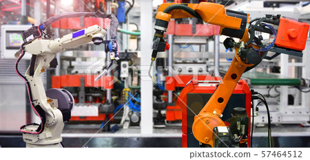 Orange Robotic and white Robotic hand machine tool system in factory, Industry Robot concept 57464512