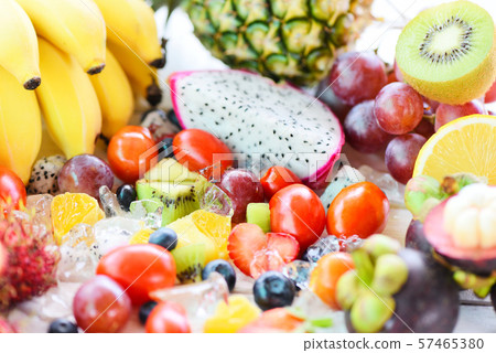 Fruit salad on ice fresh summer fruits healthy Fruit salad on ice fresh summer fruits healthy 57465380