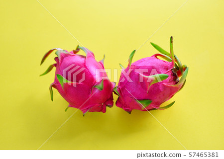 Dragon fruit slice on yellow background / Fresh 57465381