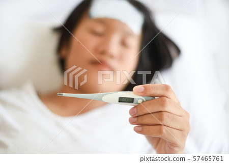 fever child with thermometer measuring temperature fever child with thermometer measuring temperature 57465761