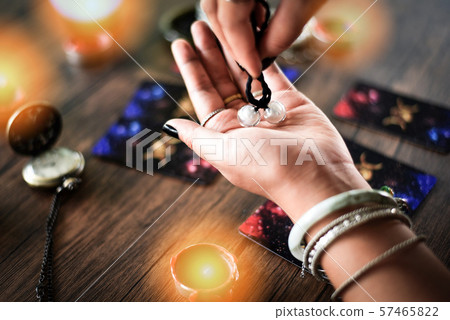 Fortune teller reading fortune lines on hand Fortune teller reading fortune lines on hand 57465822