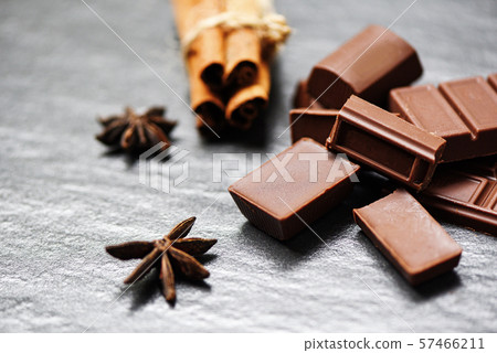 Chocolate bar and spice on dark background candy 57466211