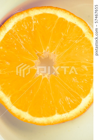 A view of a juicy ripe cut orange fruit A view of a juicy ripe cut orange fruit 57467655