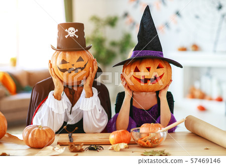 Halloween concept. couple of people dressed as Halloween concept. couple of people dressed as 57469146