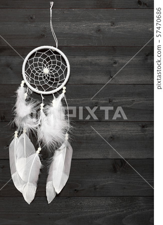 Black and white dream catcher on wood background Black and white dream catcher on wood background 57470686