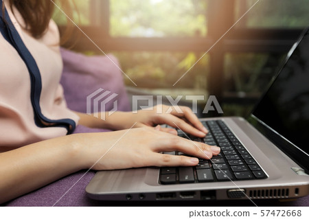 Closeup of businesswoman hands on laptop at office desk. Closeup of businesswoman hands on laptop at office desk. 57472668