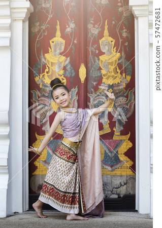Cute Thai girl wearing thai traditional clothing. Cute Thai girl wearing thai traditional clothing. 57472681