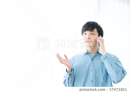 Smartphone and young men Smartphone and young men 57472801