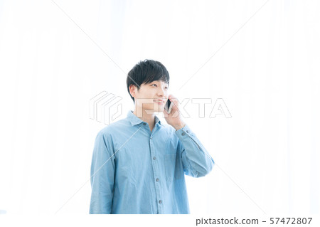 Smartphone and young men Smartphone and young men 57472807