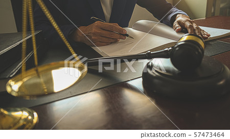 Judge gavel with Justice lawyers having team 57473464