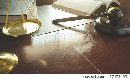 Judge gavel with Justice lawyers having team 57473465