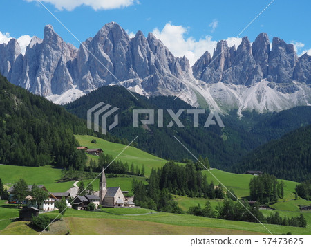 Santa Maddalena church and Geisler mountains in the Funes valley of the Dolomites 57473625