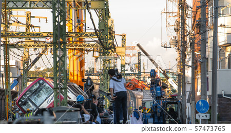 A scene of a collision accident on the Keikyu Line near Kanagawa-Shinmachi Station in Yokohama, Japan. Reporters and spectators = shooting on the afternoon of 6th 57473765