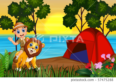 Zookeeper boy and a lion in campsite at sunset 57475288