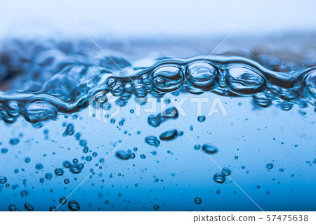 Water splash, clear blue water with waves and bubbless Water splash, clear blue water with waves and bubbless 57475638