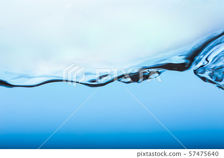Water splash, clear blue water with waves and bubbless 57475640