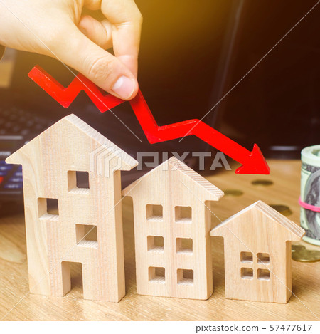 The concept of falling real estate market. Reduced The concept of falling real estate market. Reduced 57477617