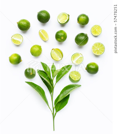 Limes with leaves isolated on white background. 57478251