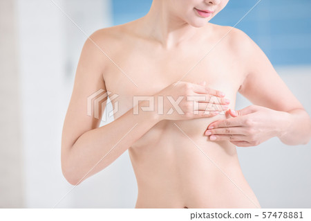 Breast cancer self check concept Breast cancer self check concept 57478881