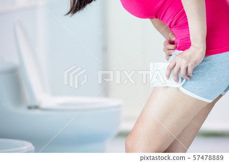 woman during menstrual cycle woman during menstrual cycle 57478889