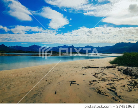 Photo of sea, sandy shore, sky in Norway on summer . Photo of sea, sandy shore, sky in Norway on summer . 57481968