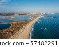 Aerial view of beautiful Meia Praia beach near tourist town Lagos, Algarve, Portugal at summer 57482291