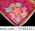 Gift set - handmade soap. Subject marine. Soap lies in a wooden box on a pink gift paper.  57482321
