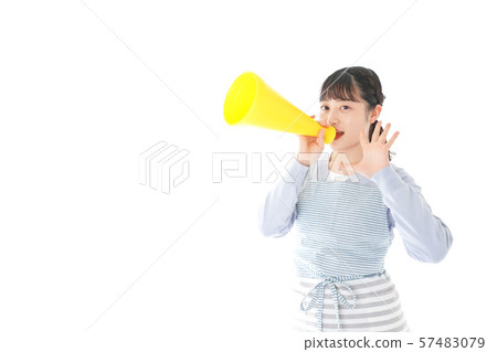 Young housewife cheering mechaphone Young housewife cheering mechaphone 57483079