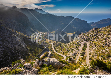 Wide view of Coll dels Reis road, sea behind Wide view of Coll dels Reis road, sea behind 57483350