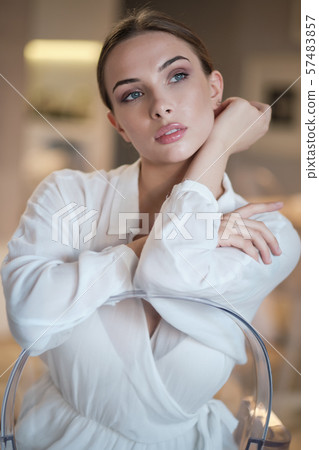 woman relaxing on her couch at home in the living woman relaxing on her couch at home in the living 57483857