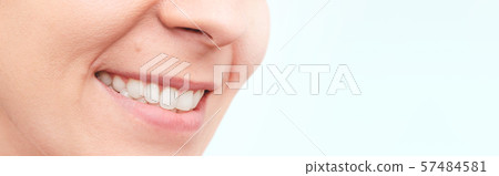 Smiling woman mouth with white teeth Smiling woman mouth with white teeth 57484581