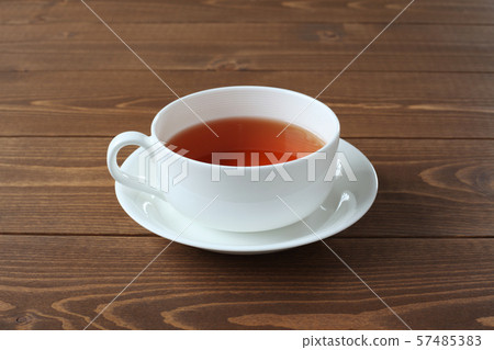 Tea hot tea cup wood table 57485383