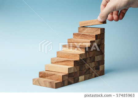 hand put wooden blocks arranging stacking hand put wooden blocks arranging stacking 57485963