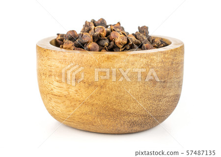 Dry brown clove isolated on white Dry brown clove isolated on white 57487135