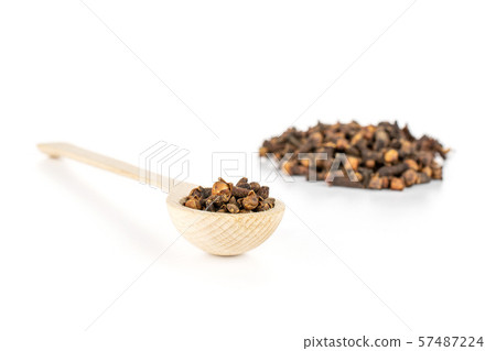 Dry brown clove isolated on white Dry brown clove isolated on white 57487224