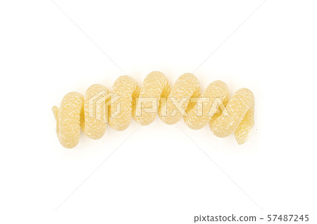 Raw pasta fusilli bucati isolated on white Raw pasta fusilli bucati isolated on white 57487245