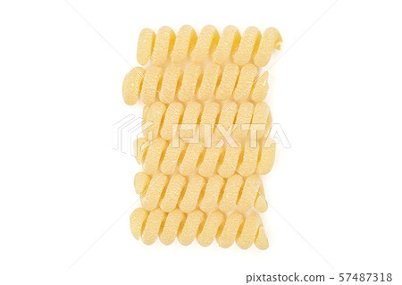 Raw pasta fusilli bucati isolated on white Raw pasta fusilli bucati isolated on white 57487318