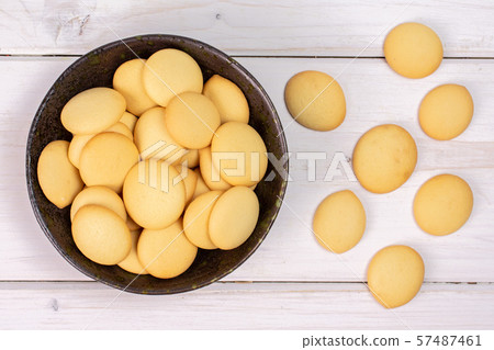 Sweet sponge biscuit on grey wood 57487461