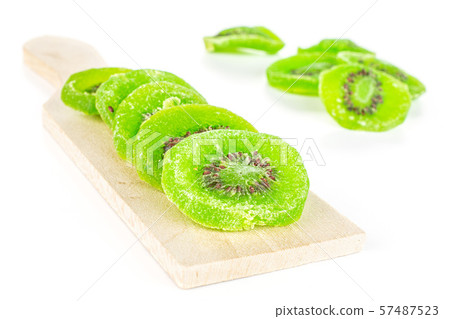 Sweet candied kiwifruit isolated on white Sweet candied kiwifruit isolated on white 57487523