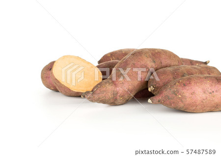 Fresh sweet potato isolated on white Fresh sweet potato isolated on white 57487589