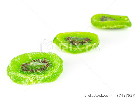 Sweet candied kiwifruit isolated on white 57487637