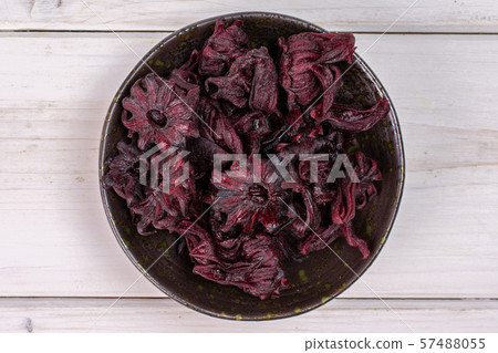 Candied hibiscus on grey wood 57488055