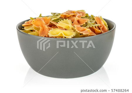 Raw farfalle tricolore isolated on white Raw farfalle tricolore isolated on white 57488264