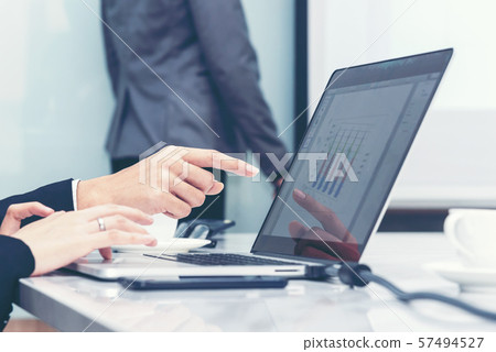 Close up finger businessman pointing financial 57494527