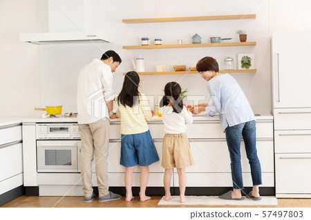 Parent and child dinner table family image 57497803