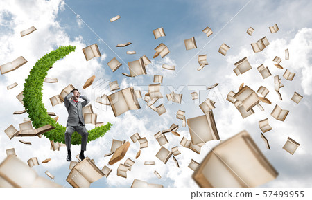 Young man in suit in blue sky dont want to hear anything Young man in suit in blue sky dont want to hear anything 57499955