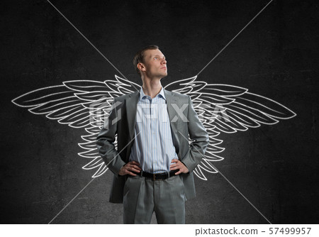 Businessman with wings Businessman with wings 57499957