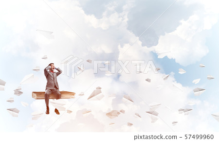 Young man in red glasses dont want to hear anything Young man in red glasses dont want to hear anything 57499960