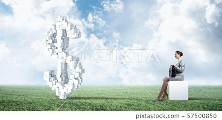 Attractive business lady or accountant outdoors on white box 57500850