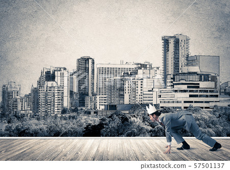 King businessman in elegant suit running and drawn cityscape silhouette at background King businessman in elegant suit running and drawn cityscape silhouette at background 57501137